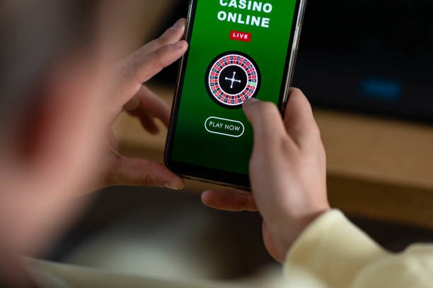 Split-screen view of live blackjack table and Starburst slot game